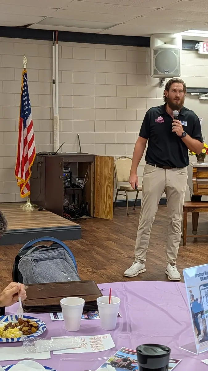 Joey Maher of Orchid Cleaning Service presenting to members at the Greater Mulberry Chamber of Commerce breakfast, September 2026