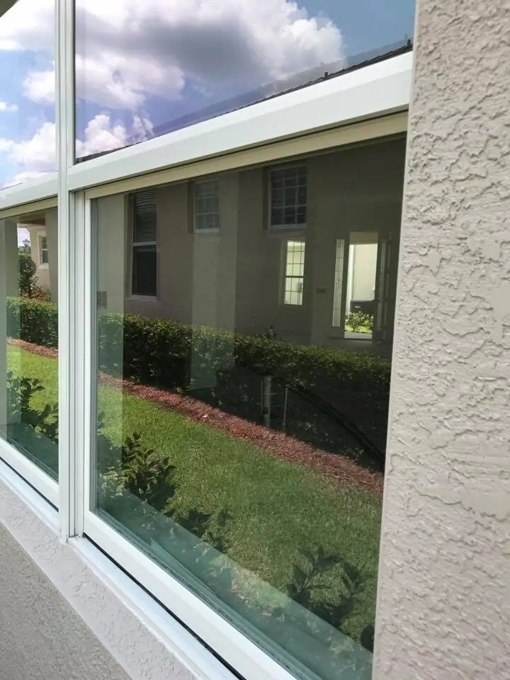 Streak-free residential window cleaned by Orchid Cleaning Service